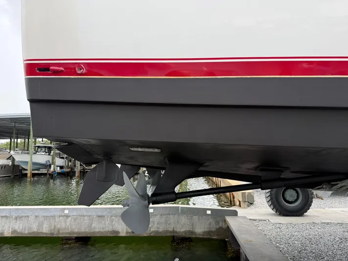 Farmers Daughter Yacht Photos Pics 2004 Viking 45 Convertible boat hull and propeller in dry dock.