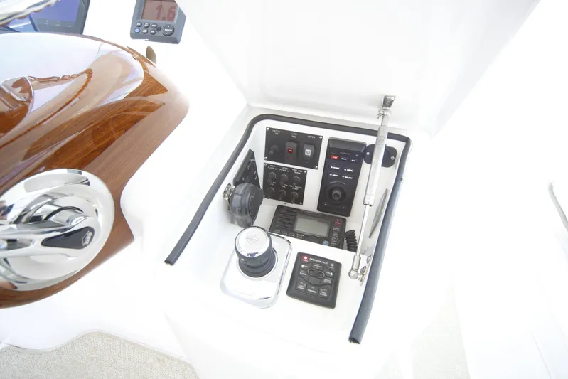 Brown Eyed Girl Yacht Photos Pics Control panel of 2014 Viking 42 Sport Tower with navigation instruments.
