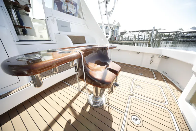 Brown Eyed Girl Yacht Photos Pics 2014 Viking 42 Sport Tower yacht deck with polished wood and sleek design.
