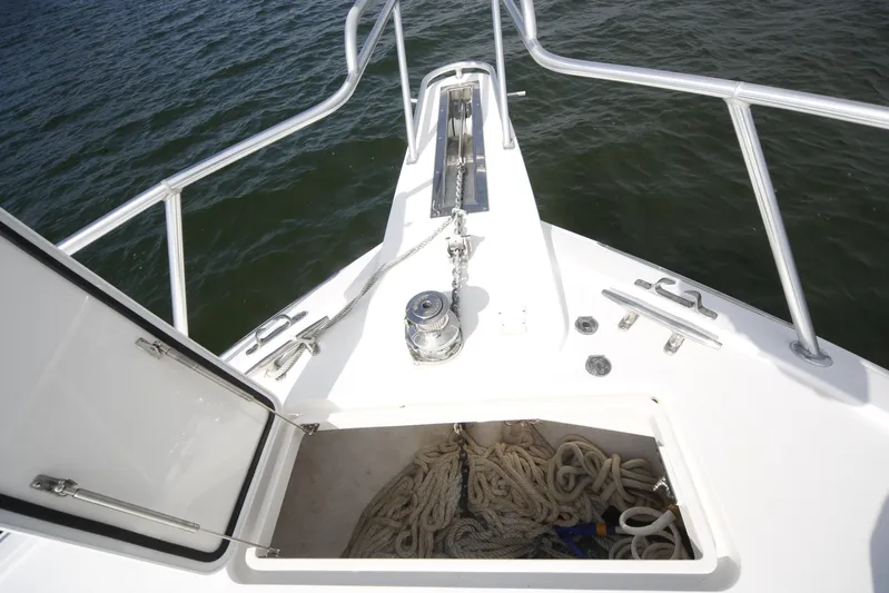 Brown Eyed Girl Yacht Photos Pics Bow of 2014 Viking 42 Sport Tower with open anchor locker and ropes.