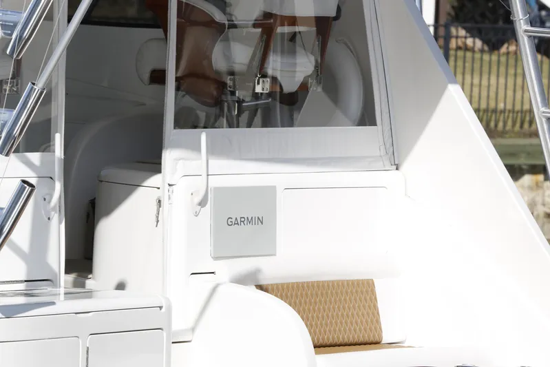 Brown Eyed Girl Yacht Photos Pics 2014 Viking 42 Sport Tower boat with Garmin equipment, featuring sleek white design.