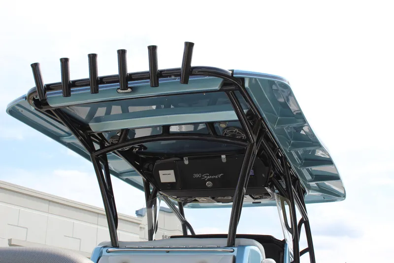  Yacht Photos Pics 2021 Nor-Tech 390 Sport Center Console boat with sleek T-top design and rod holders.