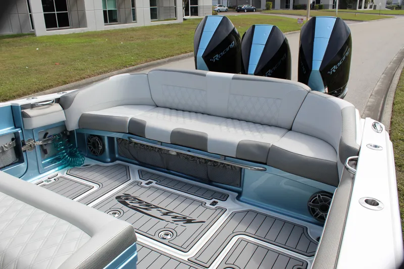  Yacht Photos Pics 2021 Nor-Tech 390 Sport Center Console with triple engines and spacious seating area.