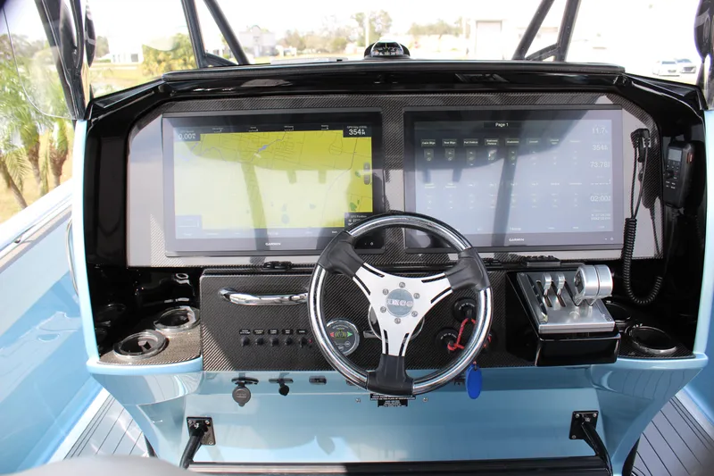  Yacht Photos Pics 2021 Nor-Tech 390 Sport Center Console dashboard with advanced navigation and control systems.