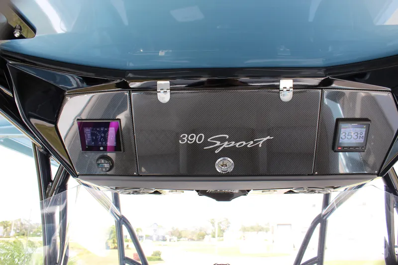  Yacht Photos Pics 2021 Nor-Tech 390 Sport Center Console dashboard with digital displays and sleek design.