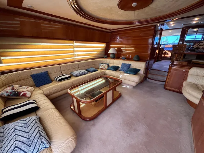  Yacht Photos Pics Luxurious interior of a 2002 Ferretti Yachts 810 with plush seating and elegant decor.
