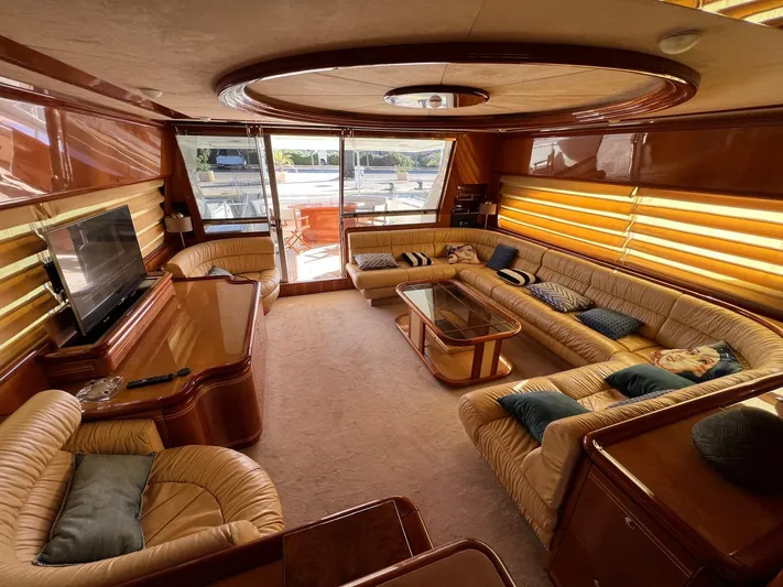  Yacht Photos Pics Luxurious interior of a 2002 Ferretti Yachts 810, featuring elegant seating and modern amenities.