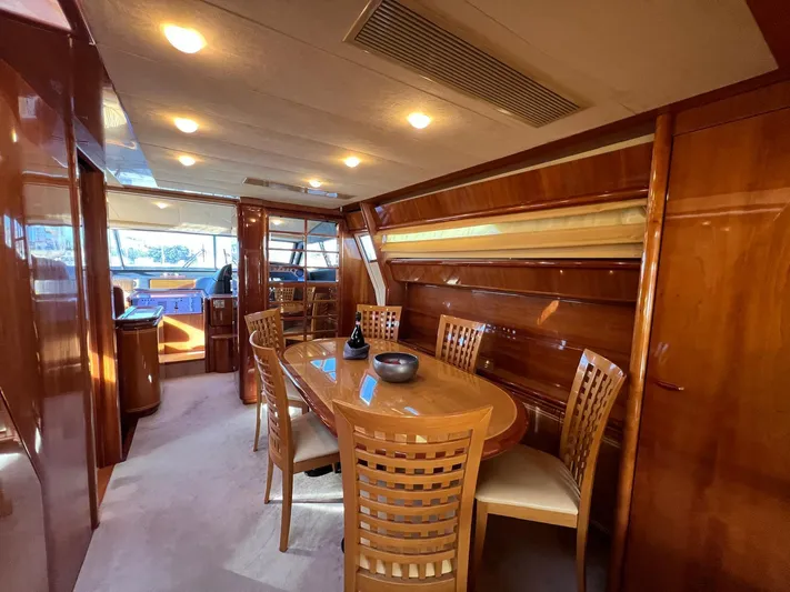  Yacht Photos Pics Luxurious interior of a 2002 Ferretti Yachts 810 with elegant dining area.