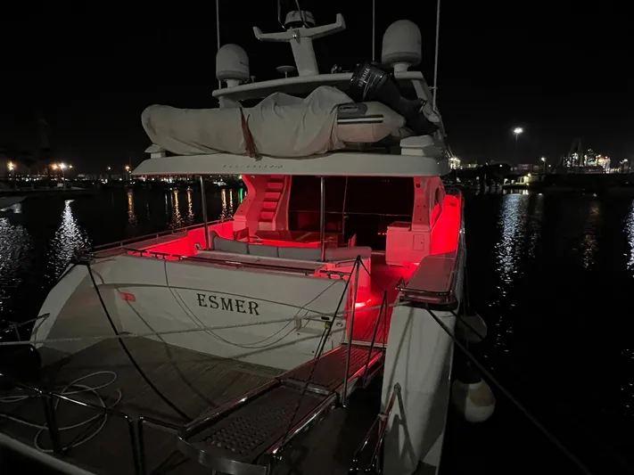  Yacht Photos Pics 2002 Ferretti Yachts 810 at night with red deck lighting, docked in a marina.