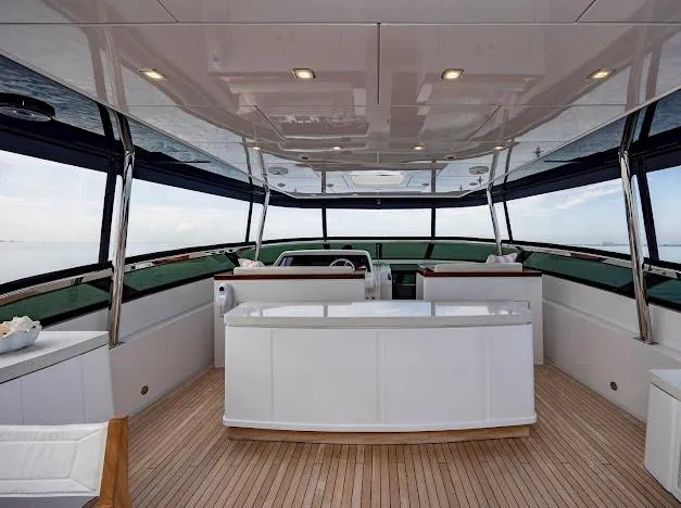 Living The Experience Yacht Photos Pics Luxurious interior of 2015 Hatteras 100 Raised Pilothouse yacht with modern design.
