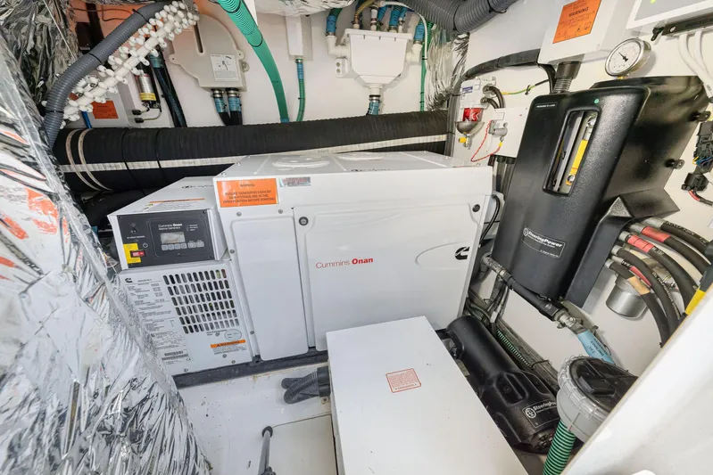  Yacht Photos Pics Engine room of 2017 Princess 56 yacht with Cummins Onan generator and wiring.