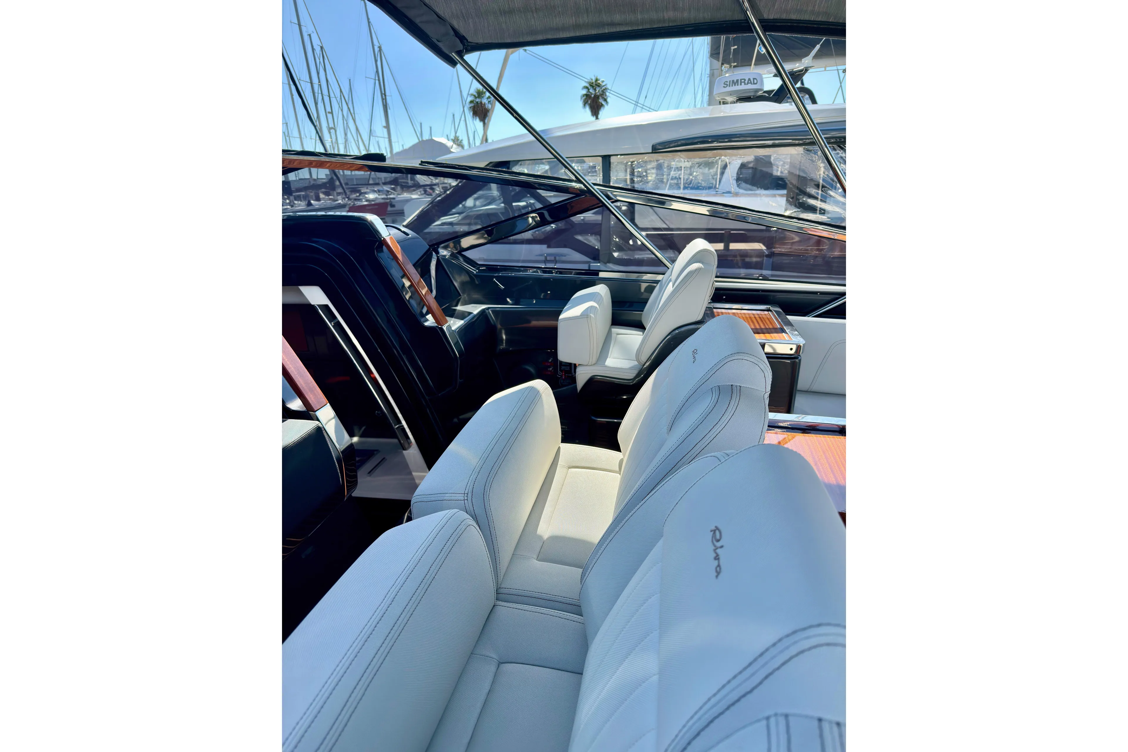  Yacht Photos Pics Luxurious interior of 2025 Riva Rivamare yacht with elegant seating and sleek design.