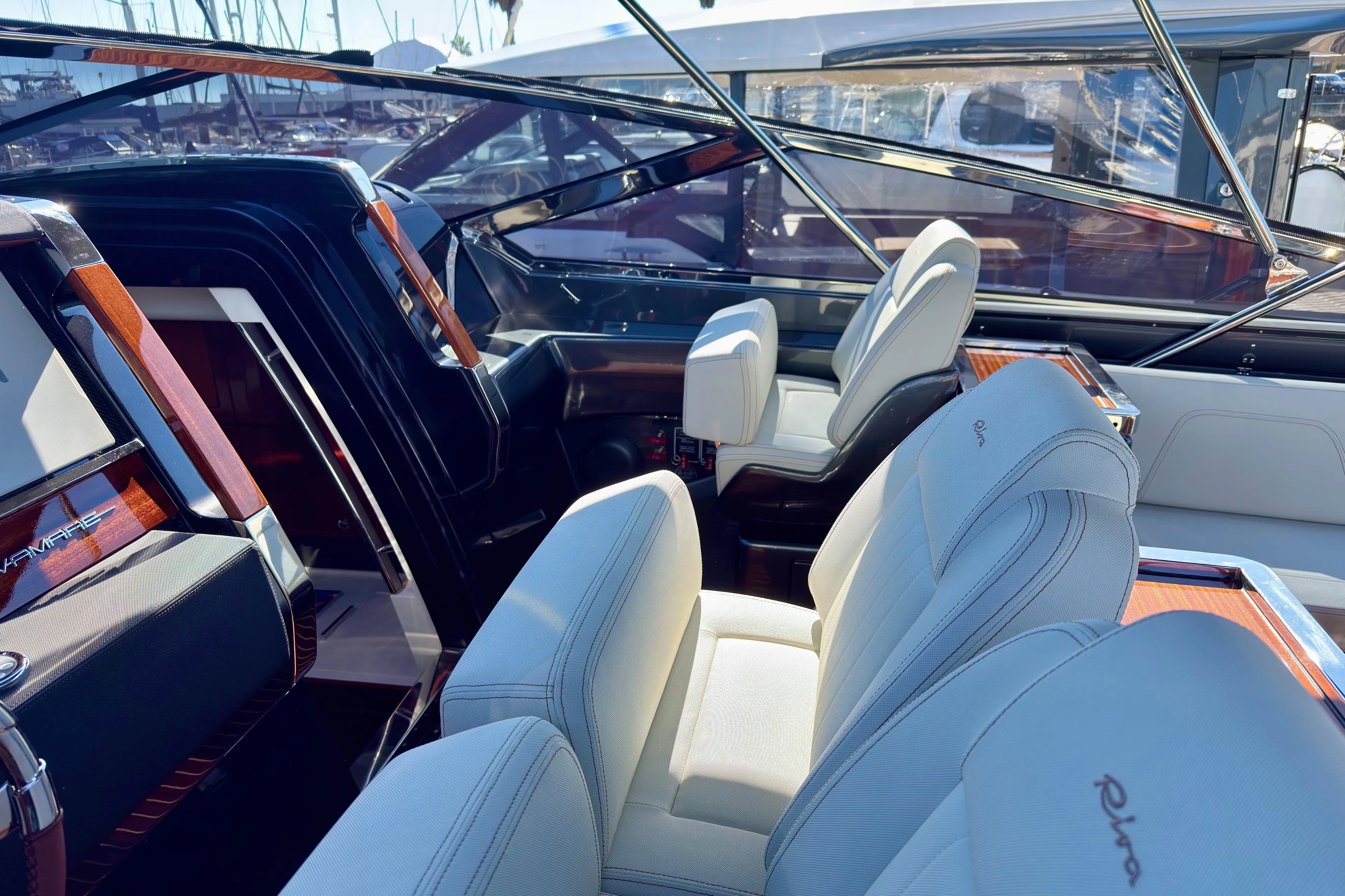  Yacht Photos Pics Luxurious interior of 2025 Riva Rivamare yacht with elegant seating and sleek design.