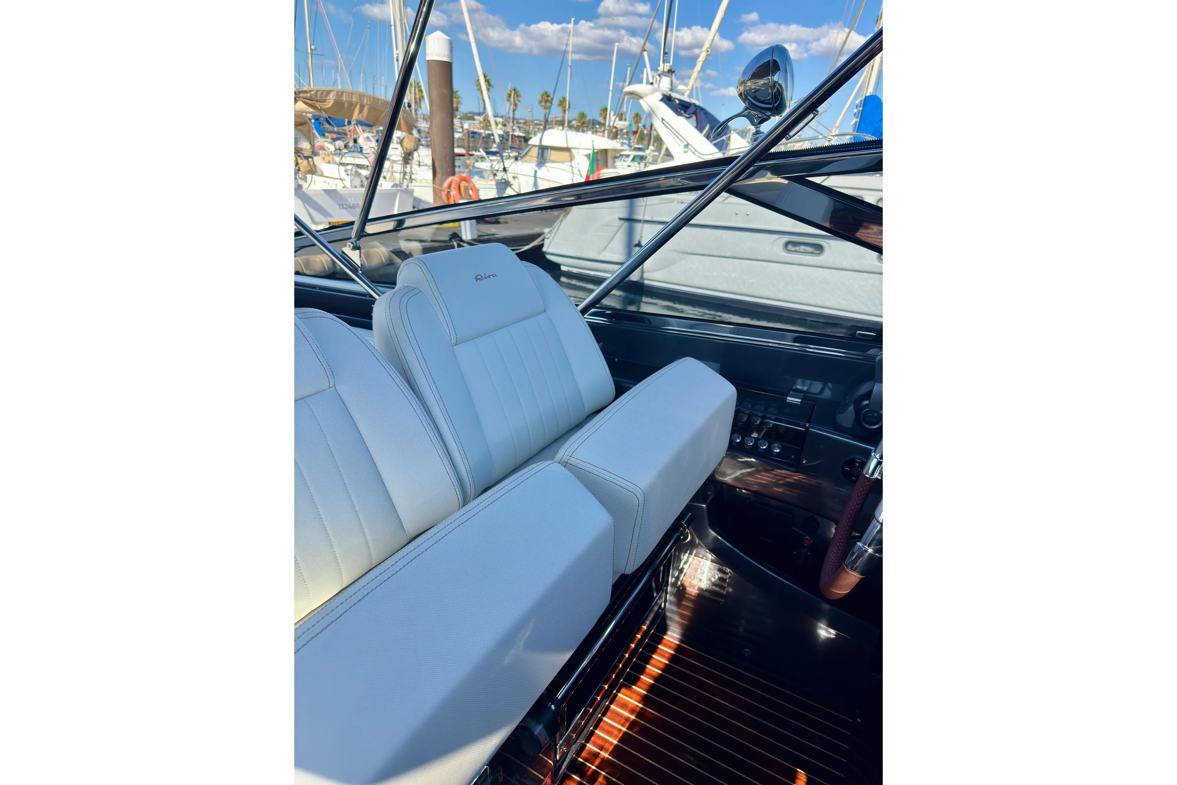  Yacht Photos Pics Interior of 2025 Riva Rivamare yacht with luxurious white seating and sleek design.