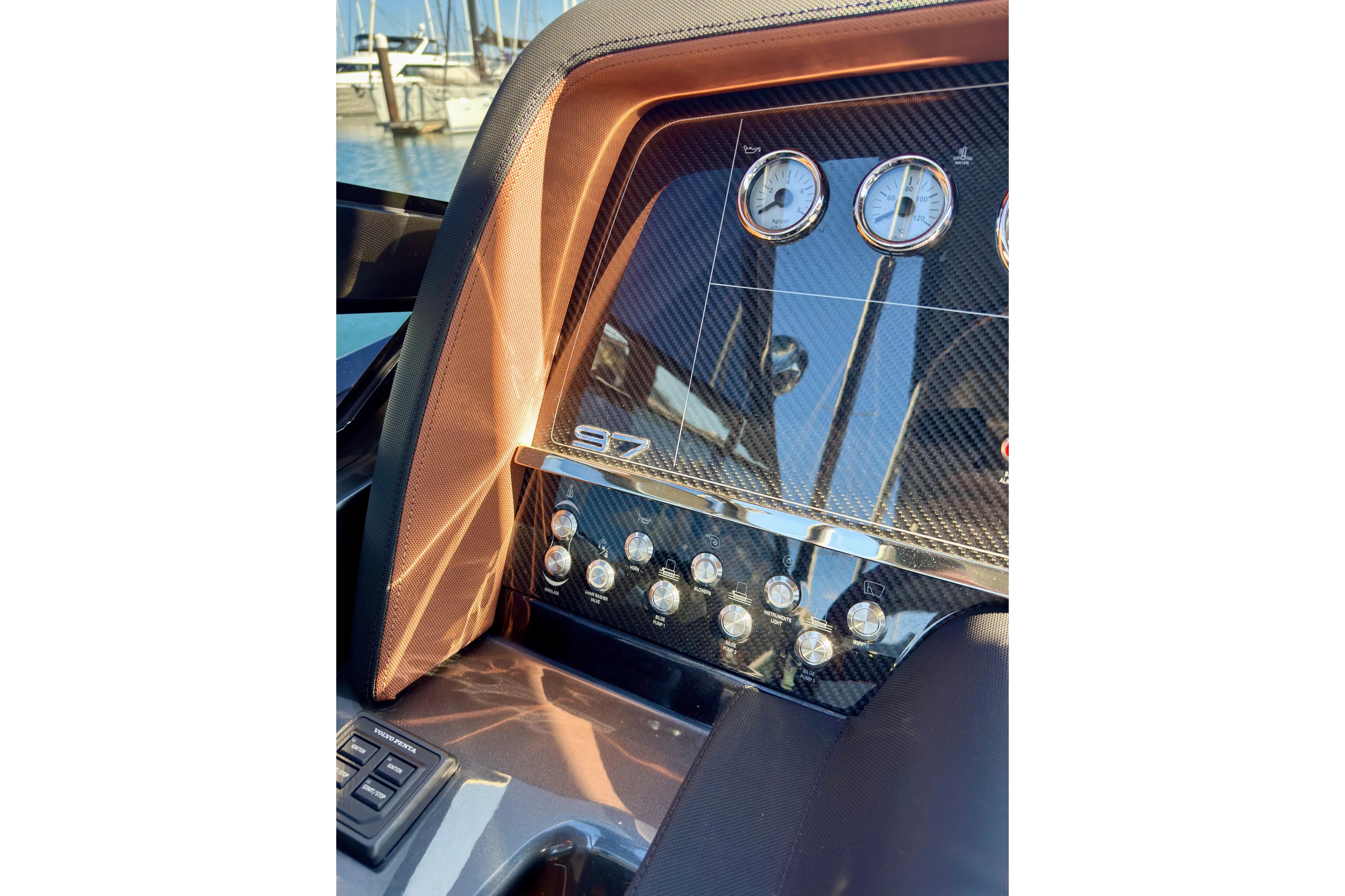  Yacht Photos Pics Dashboard of 2025 Riva Rivamare yacht with carbon fiber finish and gauges.