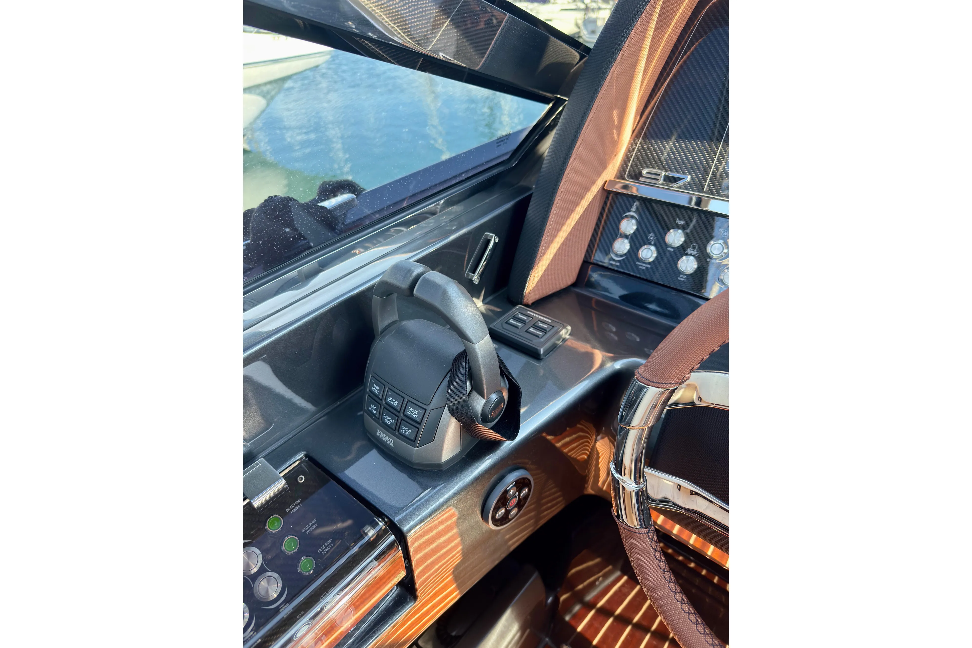  Yacht Photos Pics 2025 Riva Rivamare yacht dashboard with modern controls and luxurious steering wheel design.