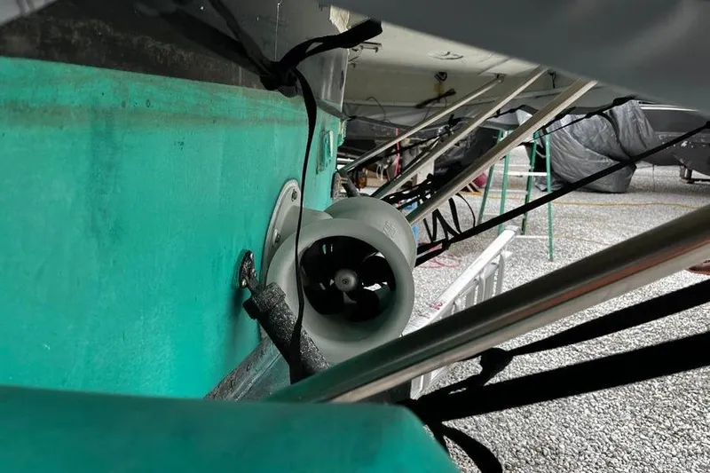  Yacht Photos Pics 2006 Mainship 34 Trawler underside with visible propeller and support structures.
