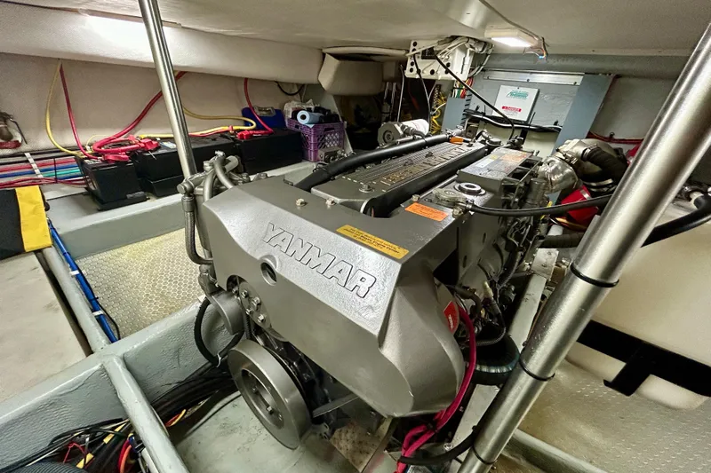  Yacht Photos Pics Engine room of 2006 Mainship 34 Trawler featuring a Yanmar engine.