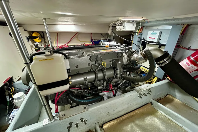  Yacht Photos Pics Engine room of 2006 Mainship 34 Trawler, showcasing detailed mechanical components.
