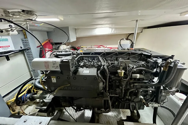  Yacht Photos Pics Engine room of 2006 Mainship 34 Trawler, showcasing detailed mechanical components.