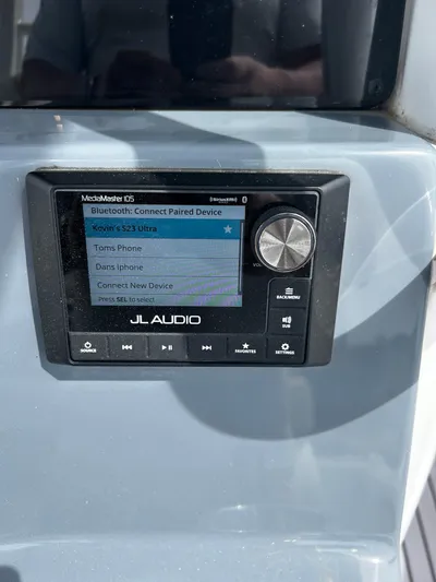  Yacht Photos Pics JL Audio system on 2024 Tidewater 280 CC Adventure boat dashboard.