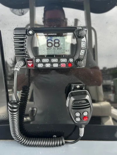  Yacht Photos Pics VHF radio on 2024 Tidewater 280 CC Adventure boat dashboard.