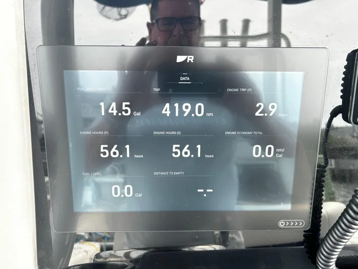  Yacht Photos Pics Display screen on 2024 Tidewater 280 CC Adventure showing fuel and trip data.