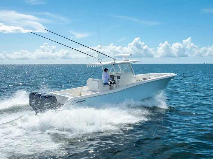  Yacht Photos Pics 2018 Invincible 36 boat cruising on open water.