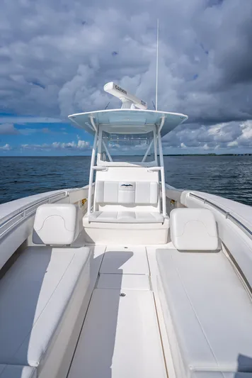  Yacht Photos Pics 2018 Invincible 36 boat on open water under cloudy sky.