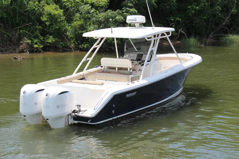  Yacht Photos Pics 2016 Pursuit S 280 Sport boat with dual Yamaha engines on a calm river.