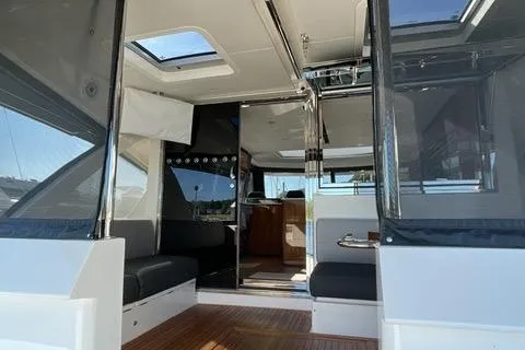  Yacht Photos Pics Interior view of 2025 Riviera 585 SUV yacht, featuring sleek design and modern amenities.