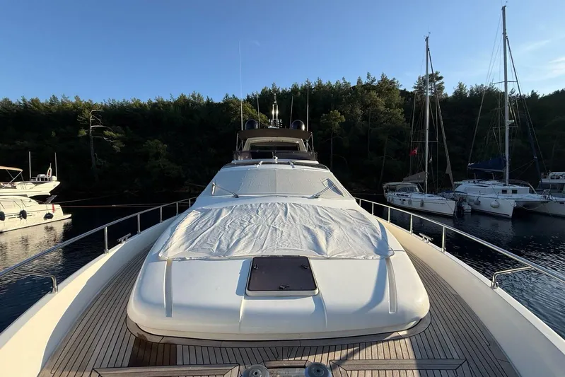  Yacht Photos Pics 2008 Ferretti Yachts 830 docked, surrounded by serene forest and other boats.