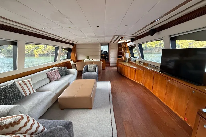  Yacht Photos Pics Luxurious interior of 2008 Ferretti Yachts 830 with elegant furnishings and panoramic windows.