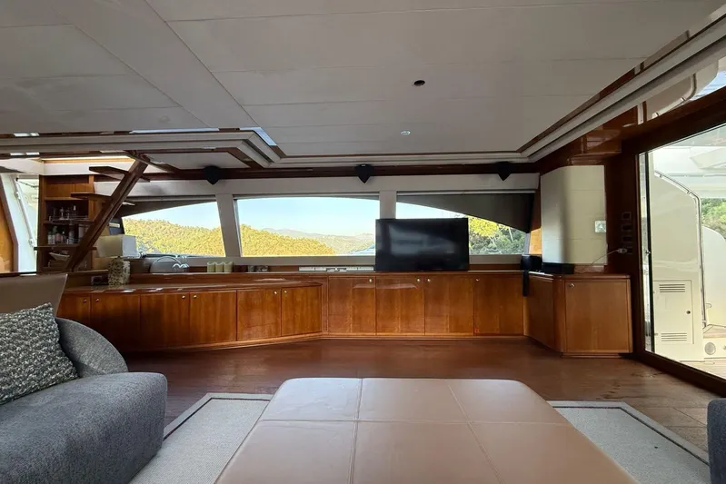  Yacht Photos Pics Luxurious interior of 2008 Ferretti Yachts 830 with panoramic windows and elegant wood finishes.