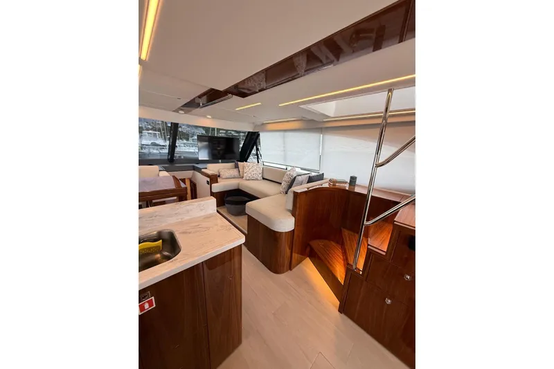  Yacht Photos Pics Luxurious interior of 2025 Riviera 50 Sports Motor Yacht with modern furnishings and elegant design.