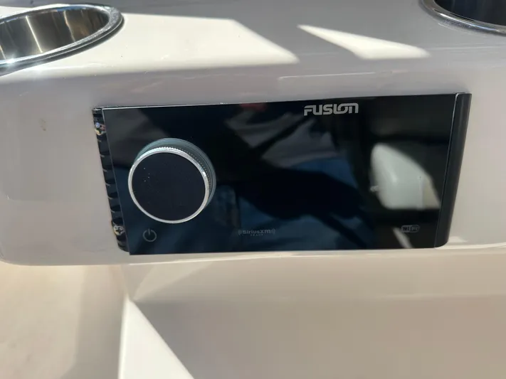  Yacht Photos Pics Fusion stereo system on 2021 Grady-White 336 Canyon boat dashboard.