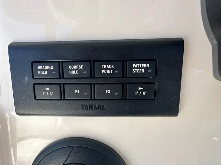  Yacht Photos Pics Yamaha control panel on 2021 Grady-White 336 Canyon boat, featuring navigation buttons.