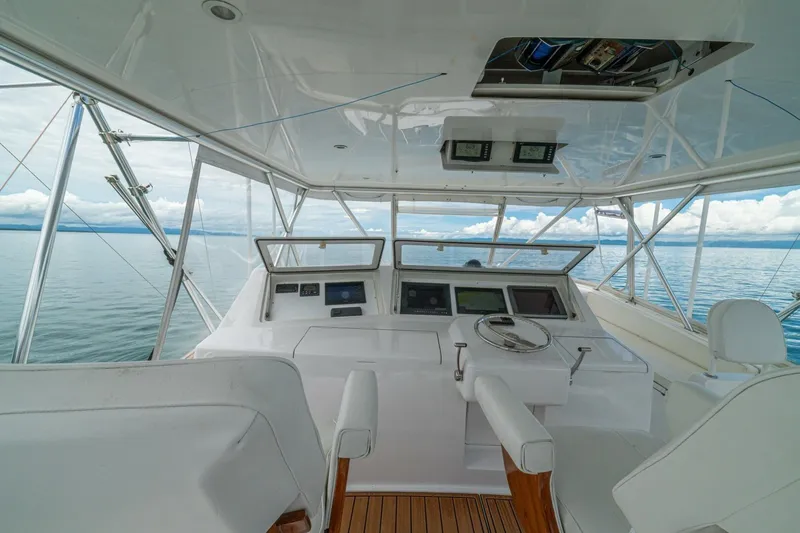 Mariah Jean Yacht Photos Pics Helm of 2004 Viking 61c yacht with ocean view and modern controls.