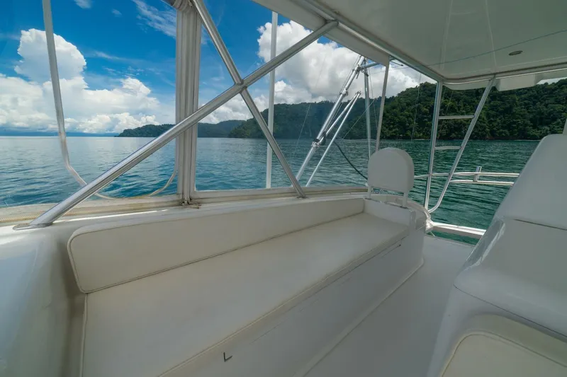 Mariah Jean Yacht Photos Pics Luxurious 2004 Viking 61c yacht interior with scenic ocean and island view.