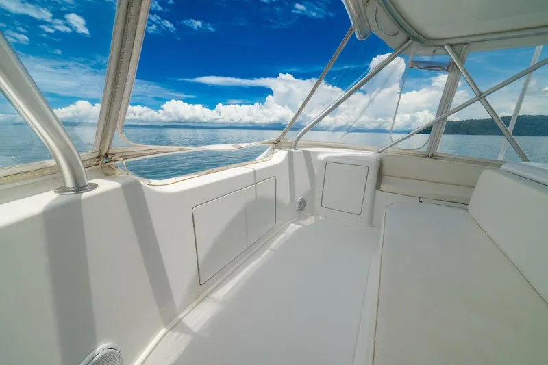 Mariah Jean Yacht Photos Pics Interior view of a 2004 Viking 61c yacht with ocean and sky background.