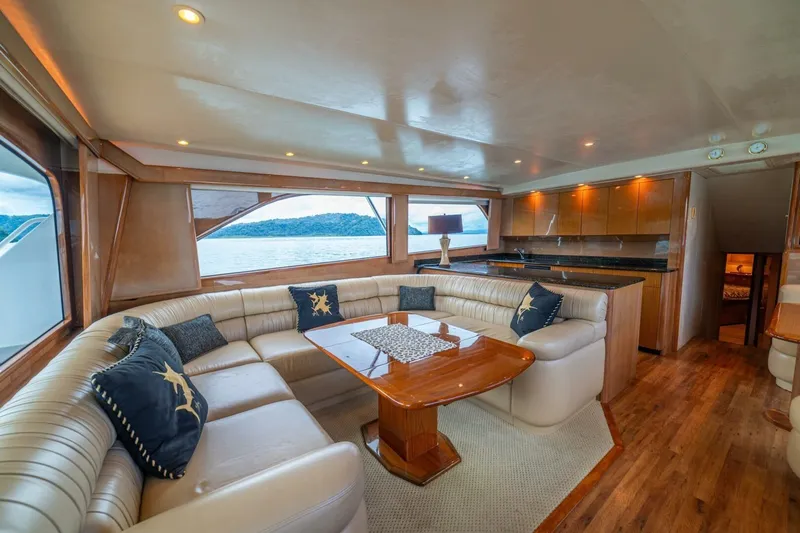 Mariah Jean Yacht Photos Pics Luxurious 2004 Viking 61c yacht interior with elegant seating and panoramic ocean views.