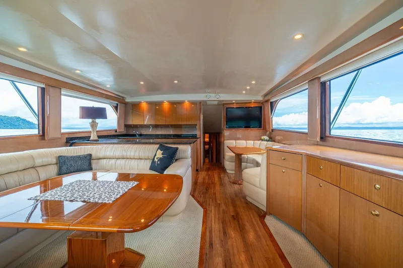 Mariah Jean Yacht Photos Pics Luxurious interior of 2004 Viking 61c yacht with elegant wood finishes and ocean views.