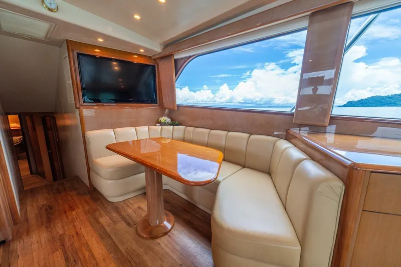 Mariah Jean Yacht Photos Pics Luxurious interior of 2004 Viking 61c yacht with leather seating and ocean view.