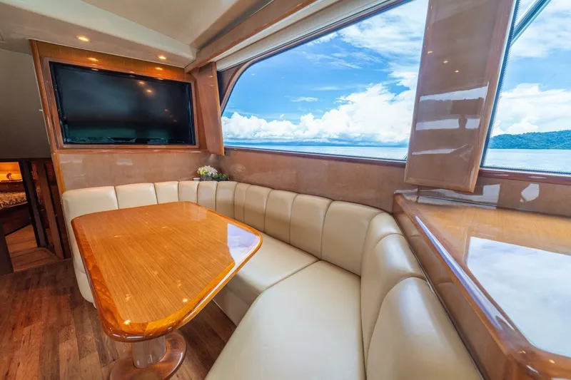 Mariah Jean Yacht Photos Pics Luxurious interior of 2004 Viking 61c yacht with leather seating and ocean view.