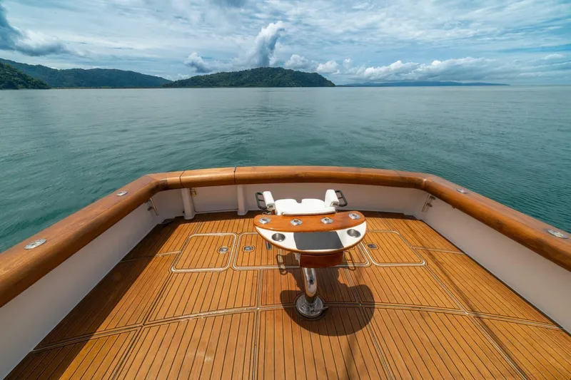 Mariah Jean Yacht Photos Pics 2004 Viking 61c yacht deck with scenic ocean view and wooden finish.