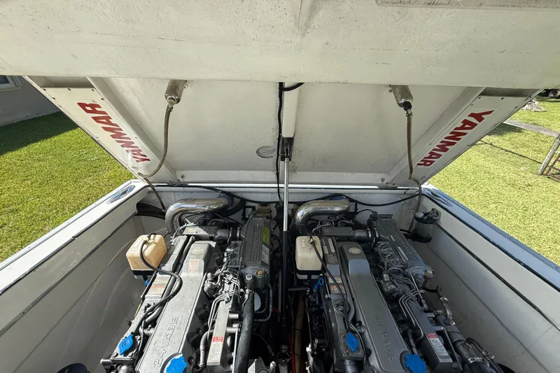  Yacht Photos Pics Engine compartment of a 2005 Apache 36CC boat with Yanmar engines.