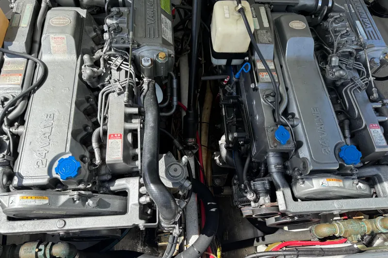  Yacht Photos Pics Twin 24-valve engines in an Apache 36CC, 2005 model, with visible components and labels.