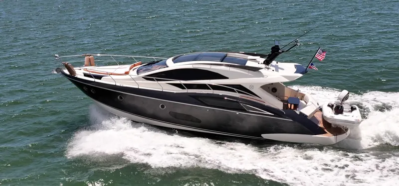 Inverse Entropy Yacht Photos Pics Luxury 2009 Marquis 500 Sport Coupe yacht cruising on open water.