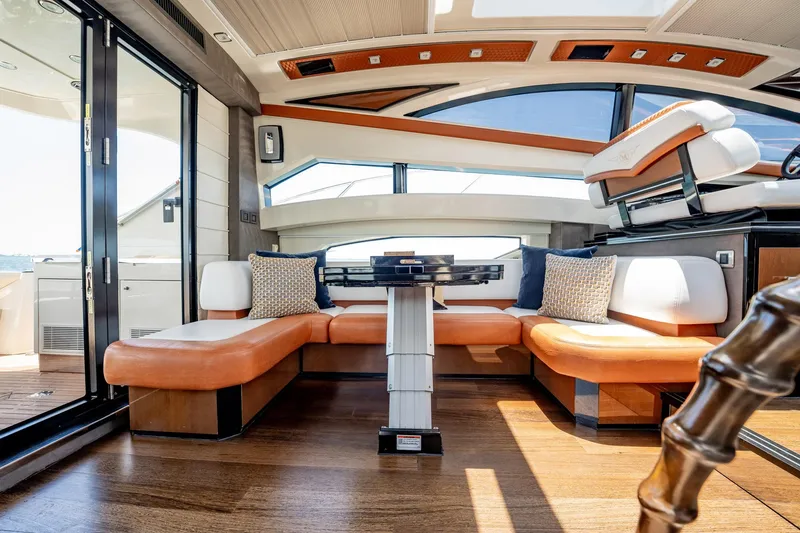 Inverse Entropy Yacht Photos Pics Luxurious interior of 2009 Marquis 500 Sport Coupe yacht with elegant seating and modern design.