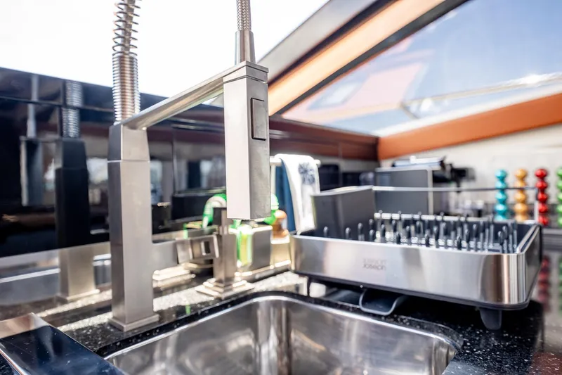 Inverse Entropy Yacht Photos Pics Modern kitchen sink and faucet in 2009 Marquis 500 Sport Coupe yacht.